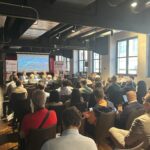 Partecipanti all’evento NIS2 di CYBERTO durante la sessione di domande e risposte con i relatori.