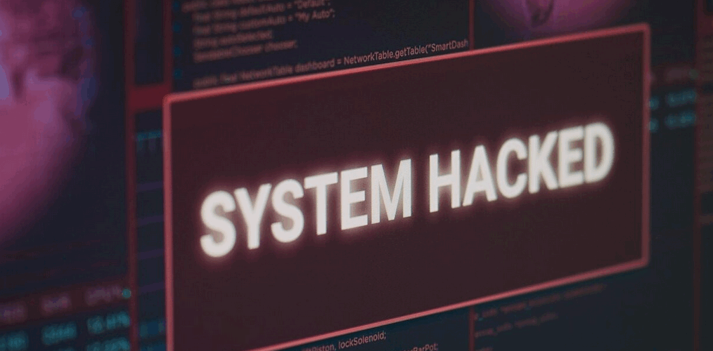 Illustrazione di un attacco ransomware con blocco dei dati aziendali e richiesta di riscatto
